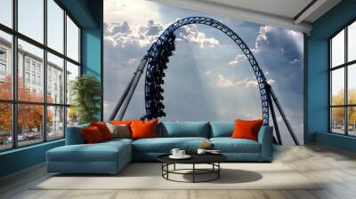 Silhouette of people having fun on a roller-coaster in an amusement park at sunset. Adrenalin concept. Wall mural