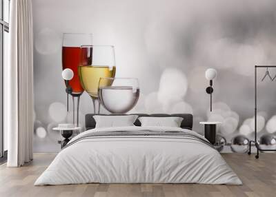 three glass of wine on an elegant background Wall mural