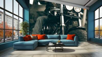 Biker in helmet and his style motorcycle on a city streets. Freedom and travel concept. Wall mural