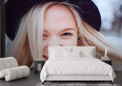 Portrait of funny smiling stylish blonde girl in hat Wall mural