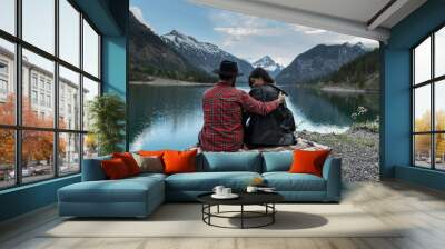 Hipster couple enjoys nature and mountains in Austria Wall mural