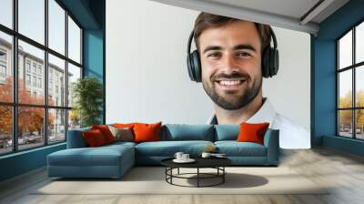 Call center person with confident smile and headphones, light white background Wall mural