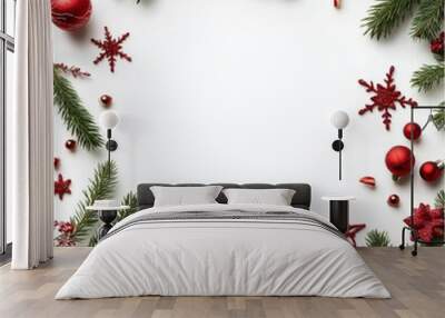 Christmas decoration frame made of fir branches and red ornaments on white background Wall mural