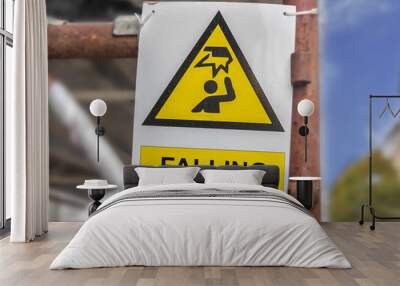 Danger construction with falling objects yellow sign Wall mural