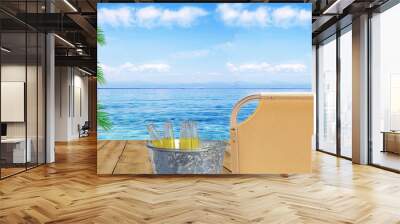 Refreshment drink of four beer bottle in bucket on wooden terrace and blue sea and palm leaf Wall mural