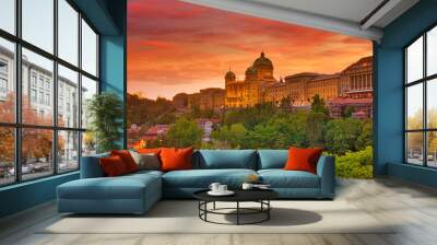 Panorama dramatic red sunset sky and Federal Palace in Bern, Switzerland. Swiss Parliament building skyline. Landmark of historical old town Bern, Capital of Switzerland, UNESCO World Heritage Site. Wall mural