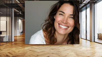 Big bright white smile headshot with a beautiful brunette woman sincere happy cheerful positive expression.  Wall mural