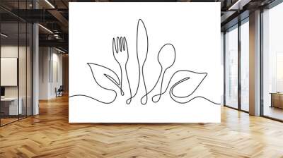 Fork, knife and spoon with vegetable leaf in continuous line art drawing style on white background. Wall mural