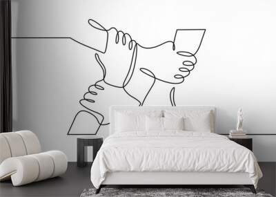 People unite their hands together continuous line drawing isolated background for Teamwork concept. Wall mural