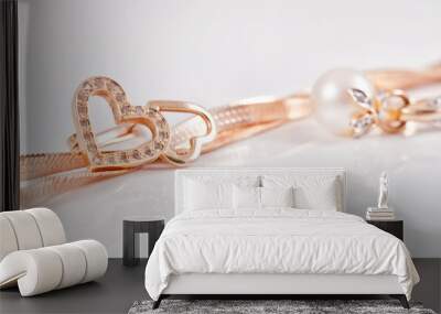 Gold earrings and ladies gold chain Wall mural