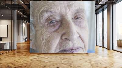 closeup face of a senior person crying Wall mural