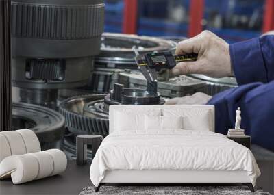 hands of a technician preparing equipment in a service Wall mural