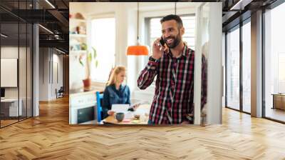 couple working at home Wall mural