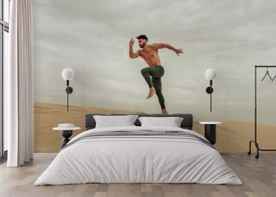 He is dedicated to fitness Wall mural