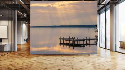 A jetty at the shore of the bathing island in Steinhude with view at the Steinhuder, Lower Saxony, Germany Wall mural