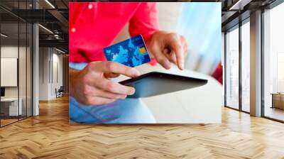 man hand credit card and tablet Wall mural