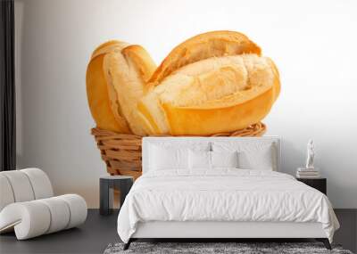 Fresh baked flour bread inside a bamboo basket in a white clean background in front view photo Wall mural