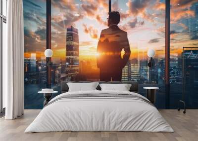 silhouetted against the rising sun and cityscape, the businessman embodies the fusion of ambition an Wall mural