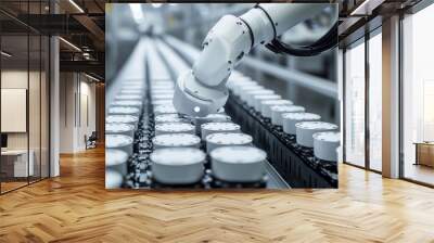 A robotic arm paints white parts for electric car batteries. These parts are made on a modern factory production line, and they move along a conveyor belt. Wall mural