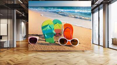 Vibrant Summer Gear Classic Sunglasses and Flip-Flops Pattern on Sandy Beach Wall mural