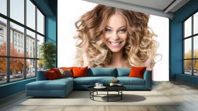 Portrait smiling girl with luxuriant hair curling. Wall mural