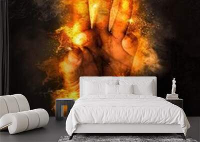 Human hand with fire background  Wall mural