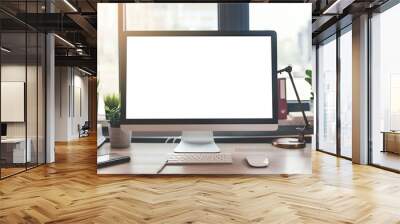 A computer monitor sits on a desk with a keyboard and mouse Wall mural