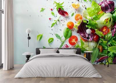 A vibrant mix of fresh salad ingredients scattered on a white background. The image emphasizes healthy eating and fresh produce. Wall mural