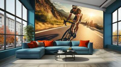 Cyclist racing at sunset on a mountain road Wall mural