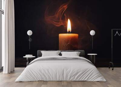 Ephemeral Light: Single Candle Burning in the Dark Wall mural