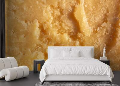 Italian Parmesan Cheese. cheese surface close-up. yellow abstract food background Wall mural