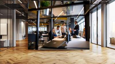 Group of young business people in the modern office Wall mural