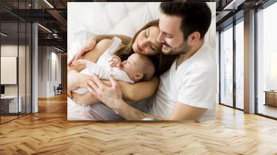 happy family with newborn baby Wall mural