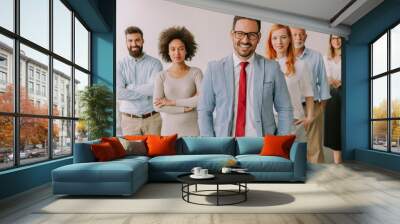 Line of happy and positive business people standing in the office Wall mural