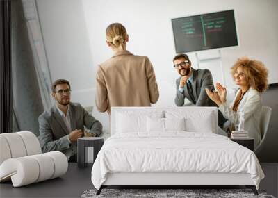 Multiethnic business people working together in the office Wall mural