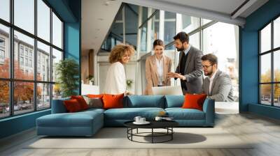 Multiethnic business people working together in the office Wall mural