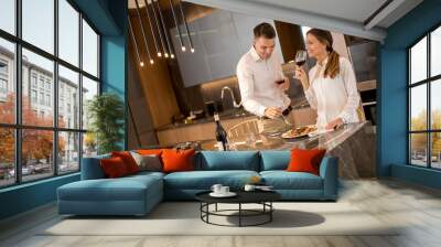 Sweet couple having a romantic dinner at luxury kitchen Wall mural