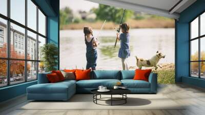 Two little girls fishing Wall mural