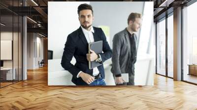 Young men in the office Wall mural