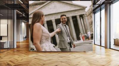 Young wedding couple by Pantheon in Rome, Italy Wall mural