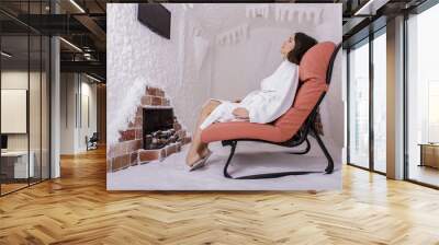 Young woman in the salt room Wall mural