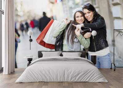 Young women in the shopping Wall mural