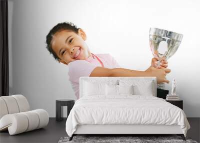 Girl, kid and trophy, celebration and champion with winner of competition isolated on png transparent background. Young female child in portrait, happiness and energy with success, award and winning Wall mural