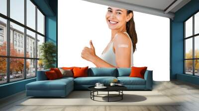 Woman, thumbs up and vaccine promotion with portrait, plaster on arm and covid isolated on png transparent background. Female person, corona immunization support and smile, healthcare and solution Wall mural