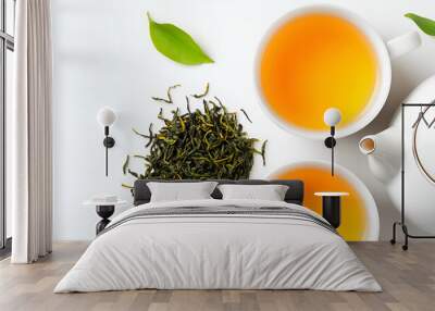 Asian tea concept, two white cups of tea and teapot surrounded by dry green tea leaves, space for text on white background, Japanese tea ceremony interior in traditional style. Wall mural