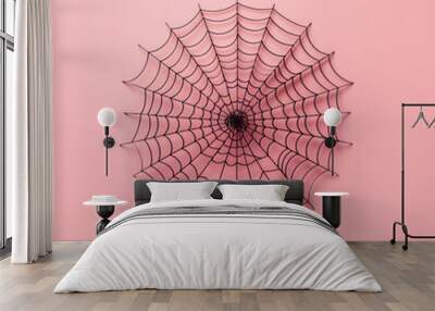 Black spider web on a pastel pink wall, minimal creative aesthetic Halloween concept Wall mural