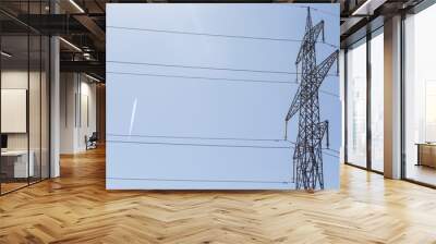 Electricity pillar high voltage line, blue sky background Wall mural