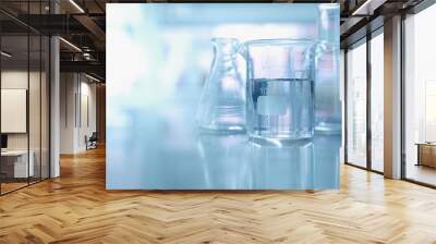 experiment water in beaker and flask in chemistry science laboratory background Wall mural