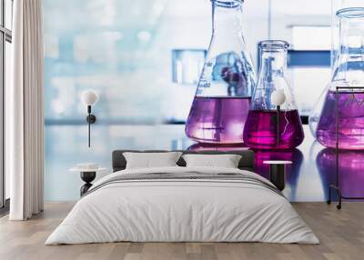 purple glass flask in blue research chemistry science banner laboratory background Wall mural