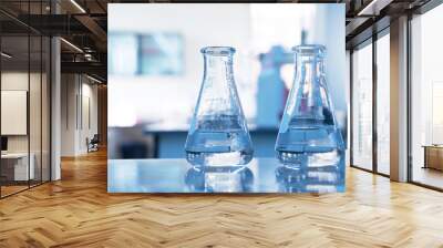 two glass flask with water in chemical science laboratory education background Wall mural